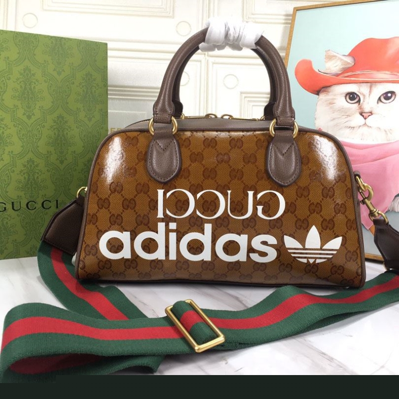 G*u*i top handle bags